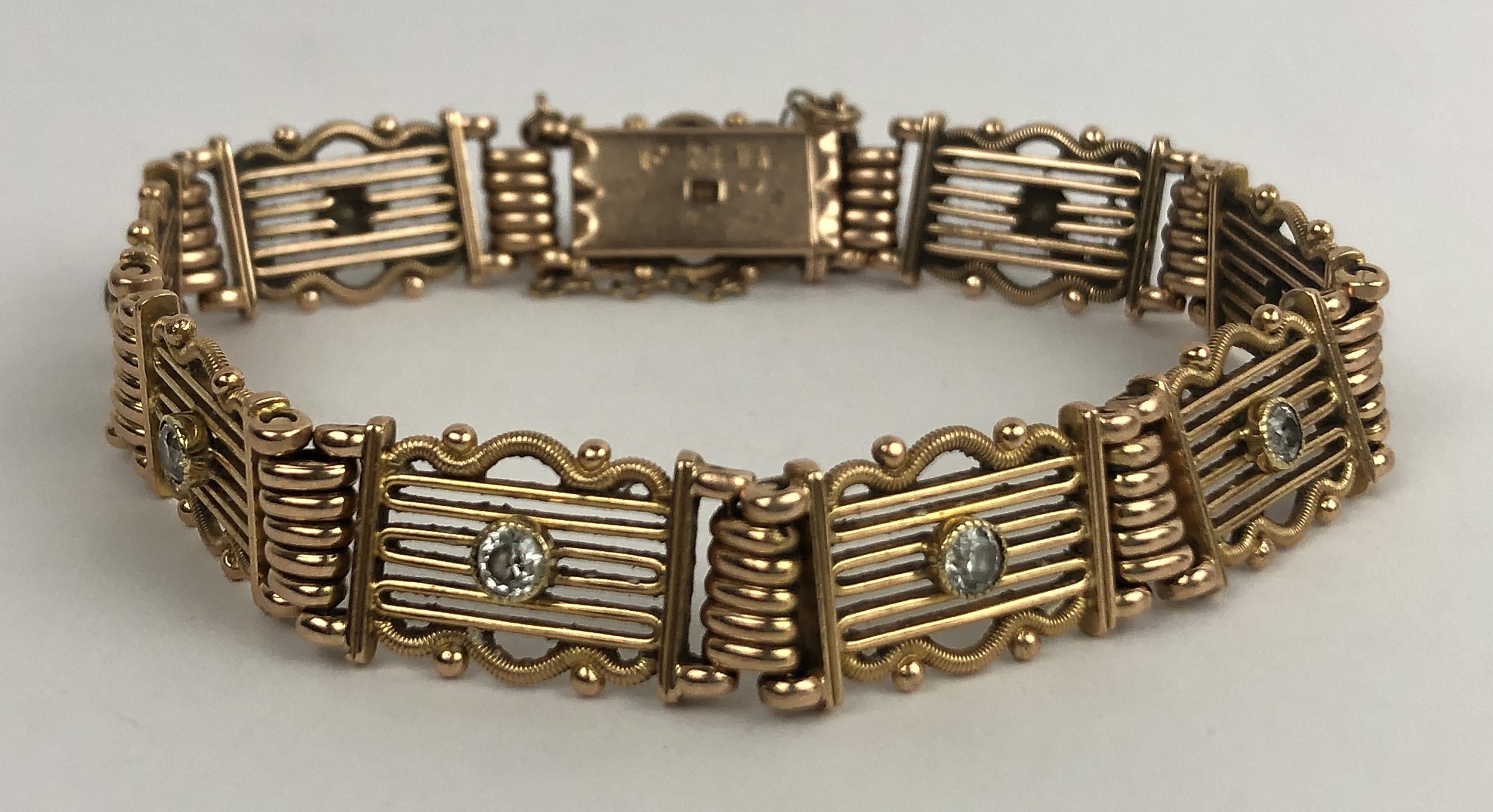An 15ct gold and diamond bracelet, all in 25.3 g width of bracelet: 11 mm approx , diamonds bright