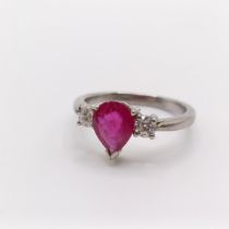 An 18ct white gold, ruby and diamond ring, ring size L