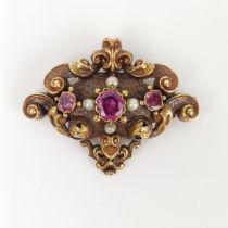 A 19th century 18ct gold, seed pearl and purple stone brooch, of lozenge form