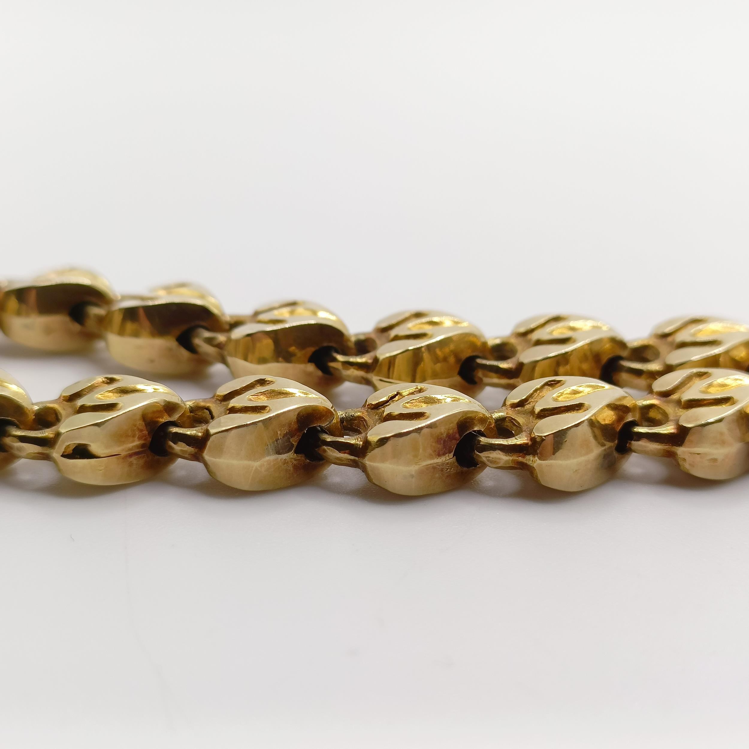 A late 19th/early 20th century yellow metal bracelet, with a padlock clasp, inset with a cabochon - Image 6 of 7
