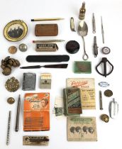 A silver coloured metal pencil, in the form of a cannon, assorted other costume jewellery and items