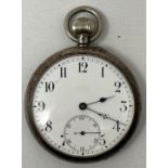 A silver coloured metal open face pocket watch