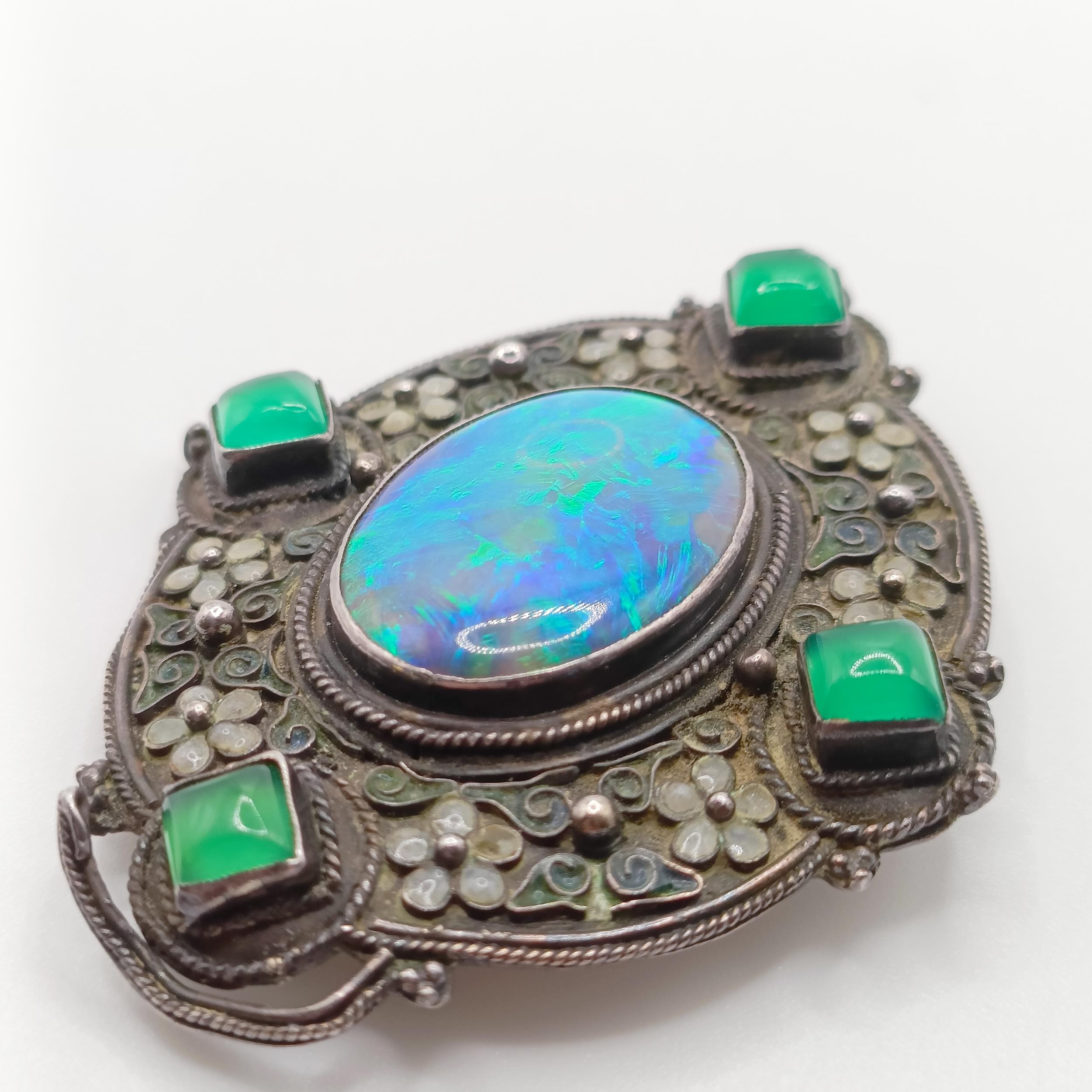 An Arts and Crafts silver coloured metal, opal, green stone and enamel brooch, by Jean Bassett - Image 3 of 5