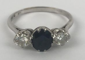 A platinum, sapphire and diamond three stone ring, diamond 0.4ct approx., in a vintage jewellery