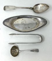 A silver stand, a pair of sugar tongs, a ladle, and a fiddle pattern spoon, various dates and marks,