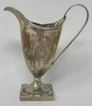 A George III silver cream jug, London 1782 Base filled, all in 6.8 ozt