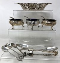 A set of three silver salts, assorted spoons and a pierced dish, various dates and marks (13)