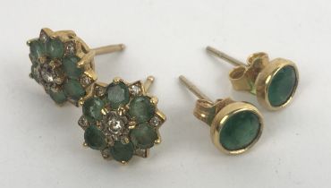 A pair of emerald and diamond stud earrings (2)