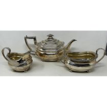 An early 19th century silver three piece tea service, marks rubbed, 34.6 ozt (3) Ivory Exemption