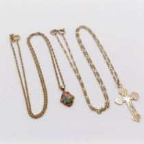 A 9ct gold cross pendant, on a chain, and an opal pendant on a chain (2) 4.8 g all in