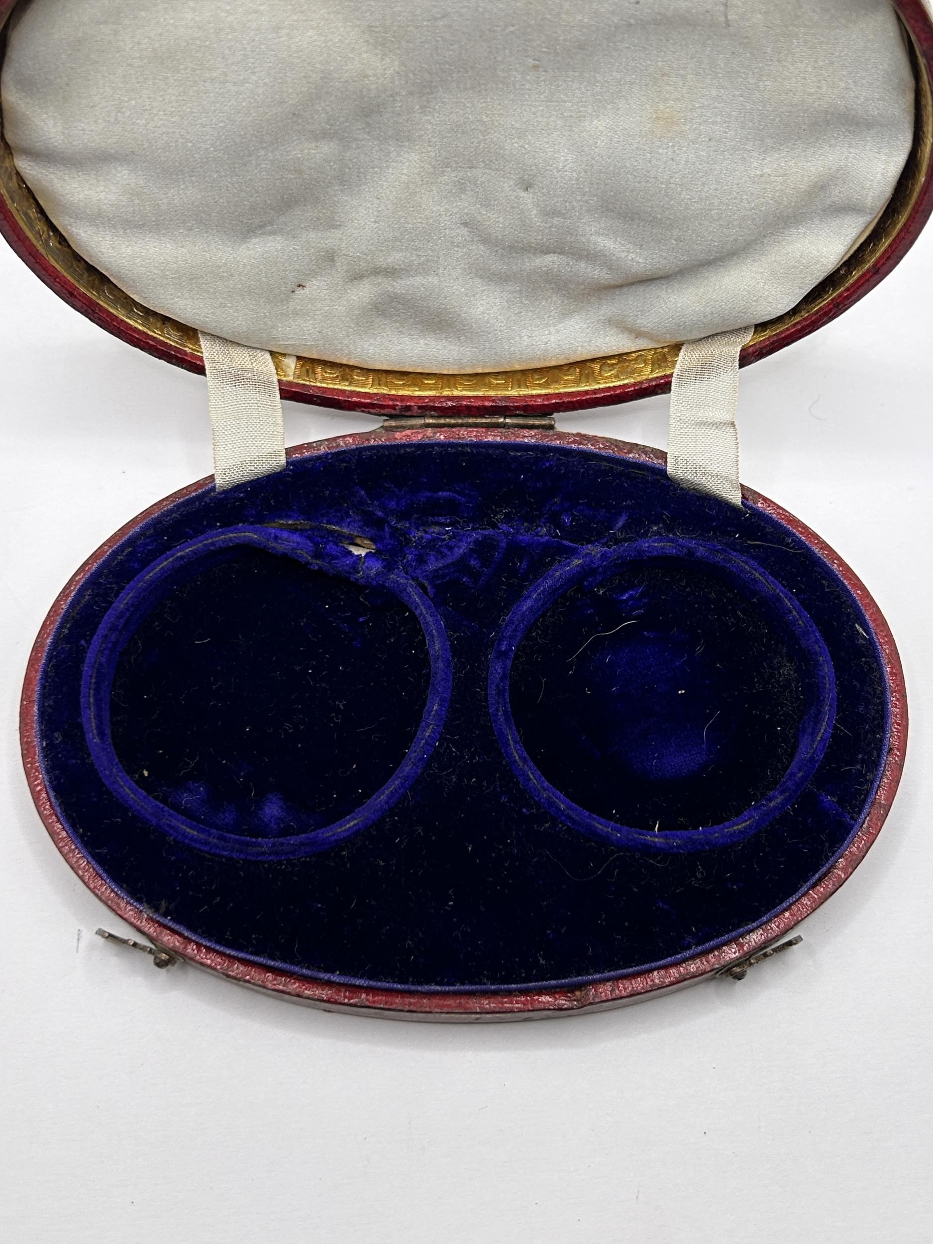 An early/mid 19th century French oval box, to hold two pocket watches, the cover tooled in gilt 'DON - Image 4 of 5