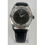 A gentleman's Universal Geneve Polerouter Automatic Microtor wristwatch, with a black dial currently