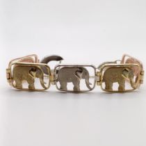 A 9ct tri-coloured gold bracelet, decorated elephants, 34.4 g Approx. length: 20 cm