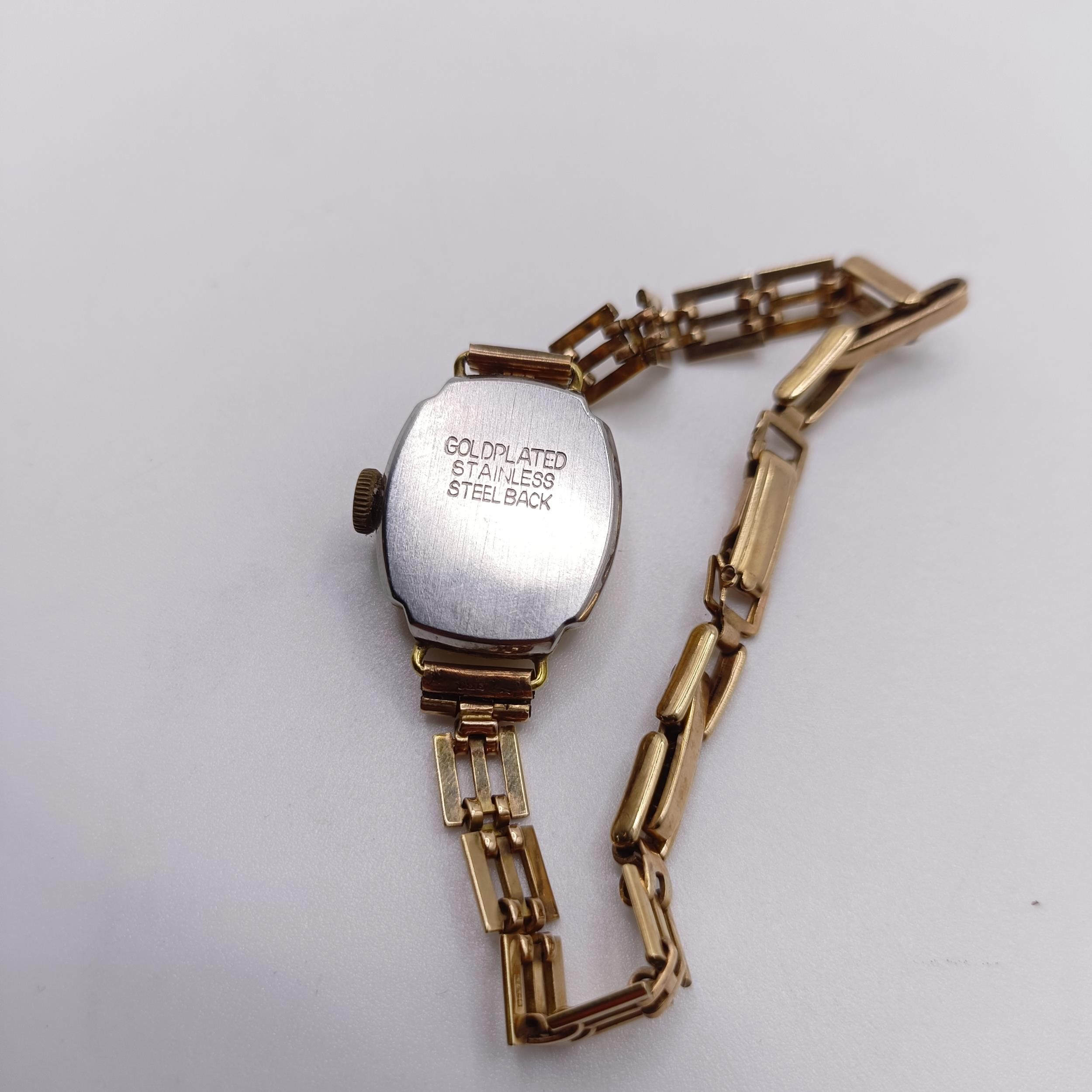 A 9ct gold chain, 3.3 g, and a ladies Giroxa wristwatch, on a 9ct gold strap (2) Gold chain - Image 9 of 9