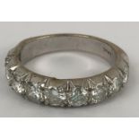 An 18ct white gold and diamond half eternity ring, ring size M