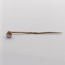 A diamond stick pin