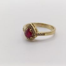 A 14ct gold, ruby and diamond ring, ring size O