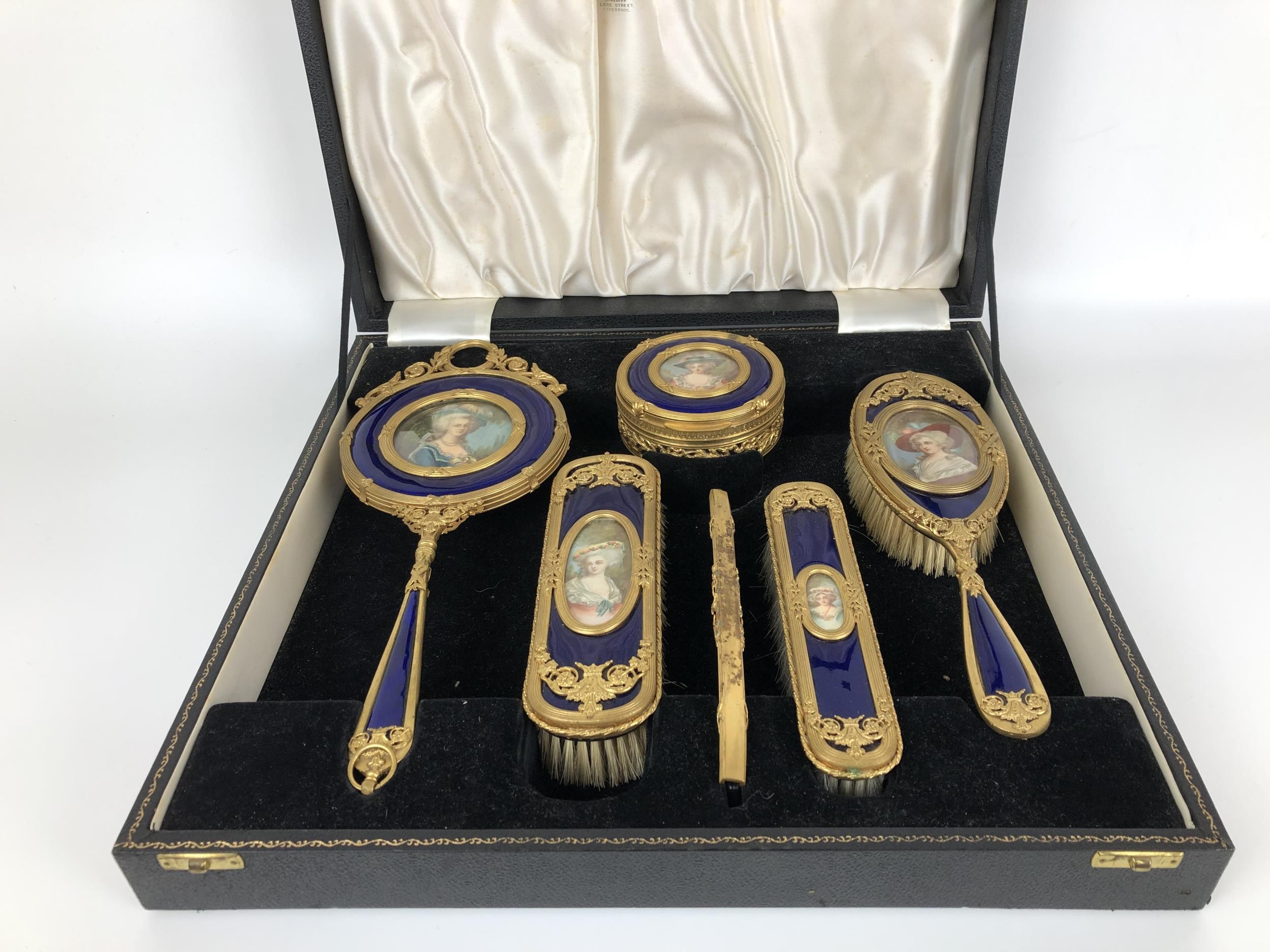An impressive early 20th century gilt metal and blue enamel dressing table set, inset with - Image 8 of 10