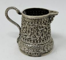 An Indian silver coloured metal cream jug, 3.58 ozt Approx. dimensions: Height: 7.5 cm Top aperture: