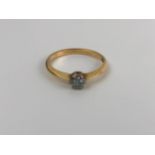 A 9ct gold and diamond solitaire ring, ring size M