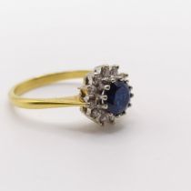 An 18ct gold, sapphire and diamond ring, ring size O