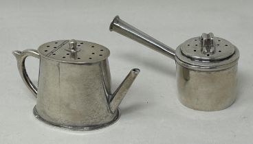 A late Victorian novelty pepper, in the form of a teapot, London 1898, and another, in the form of a
