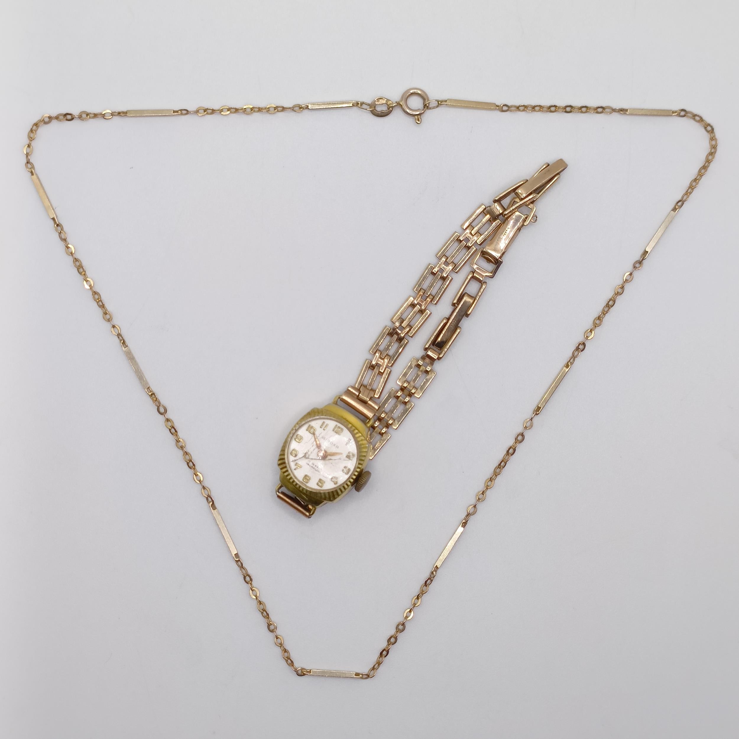 A 9ct gold chain, 3.3 g, and a ladies Giroxa wristwatch, on a 9ct gold strap (2) Gold chain