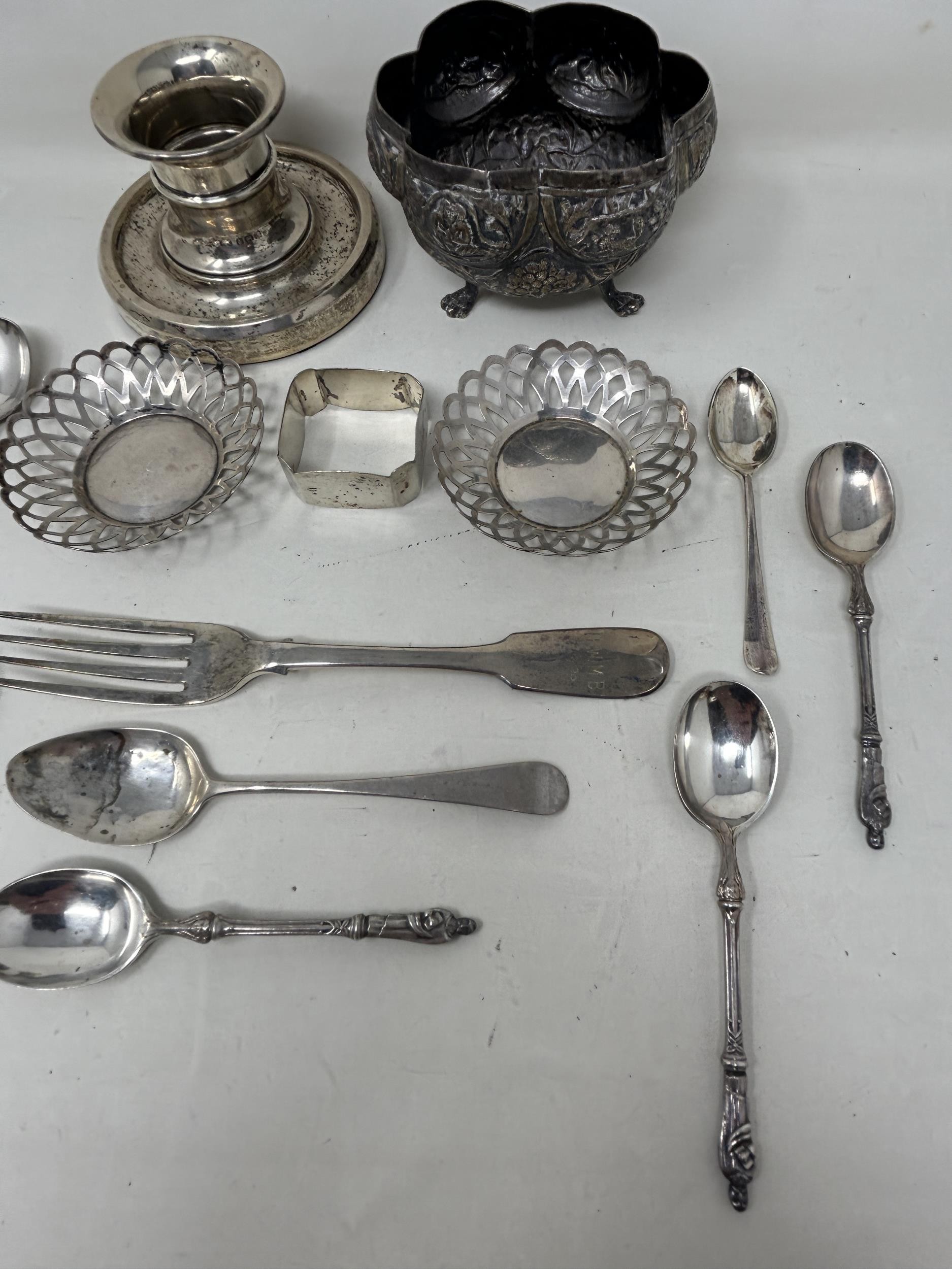 An Indian silver coloured metal sugar bowl, assorted teaspoons, a napkin ring, a pair of pierced - Image 2 of 5