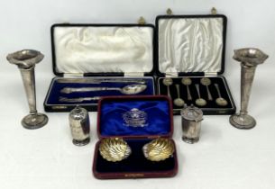 A set of six silver coffee spoons, cased, a pair of salts, a knife, fork and spoon, a mustard pot,