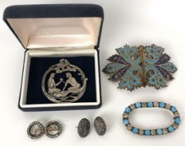 An early 20th century paste and turquoise coloured stone oval brooch, an Indian buckle, and other