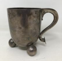 A George III silver mug, raised on three ball feet, by John King, London 1794, 12 ozt