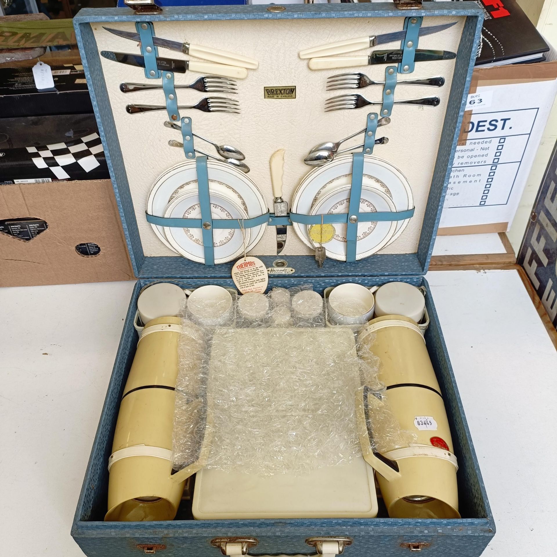 A Brexton picnic set, retailed by Harrods, virtually unused, 50 cm wide, a picnic set, in a case