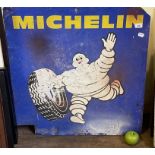A Michelin metal sign, 73 cm wide, and three Castrol signs (4)