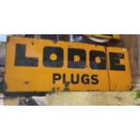 An enamel sign, Lodge Plugs, 45.5 x 122 cm Some loss, has been folded between the G and E