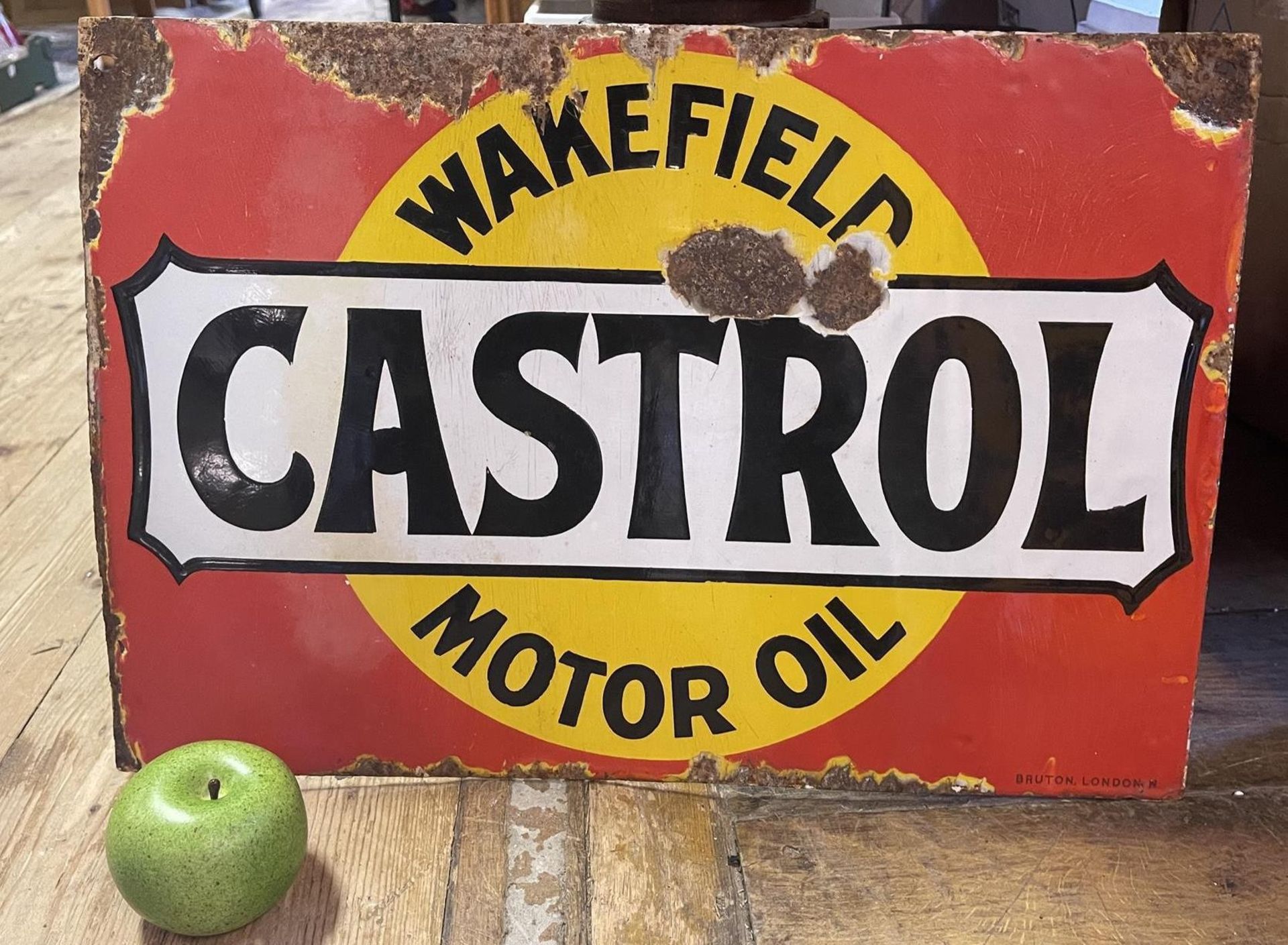 A double sided enamel sign, Wakefield Castrol Motor Oil, Bruton, London W, 34 x 50 cm Some loss - Image 2 of 2