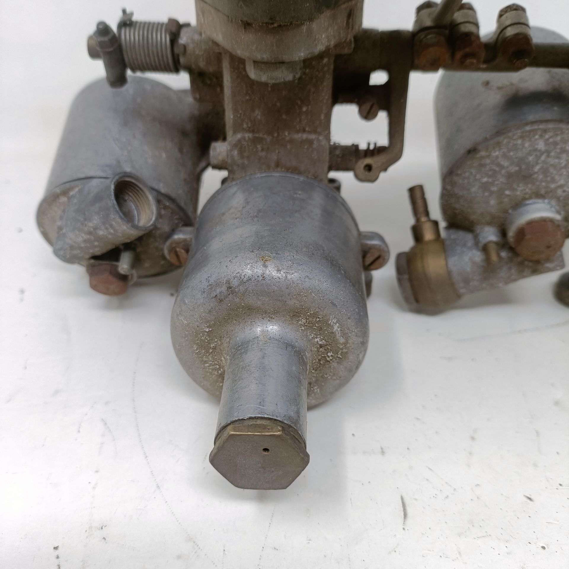 A pair of 1 1/4 inch SU carburettors, 6 inches between centres, on a manifold - Image 9 of 12