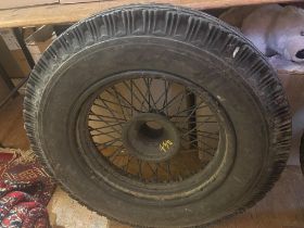 A pair of 18 inch wire wheels, 52 mm hub, side laced 4 and 5 inch rim, 2 1/4 inch offset, with