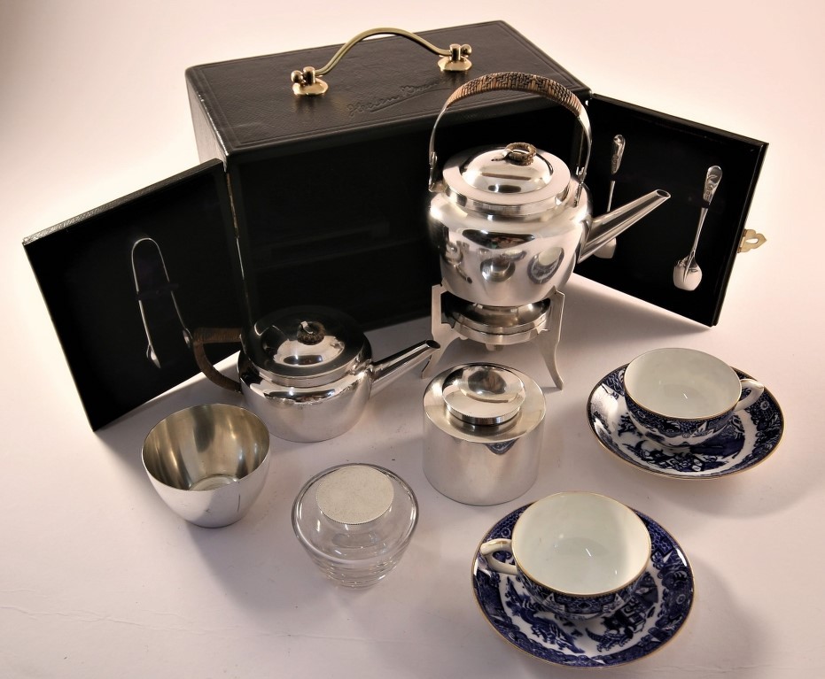 An early 20th century travelling two person picnic set, circa 1900-1904, the silver plated set by