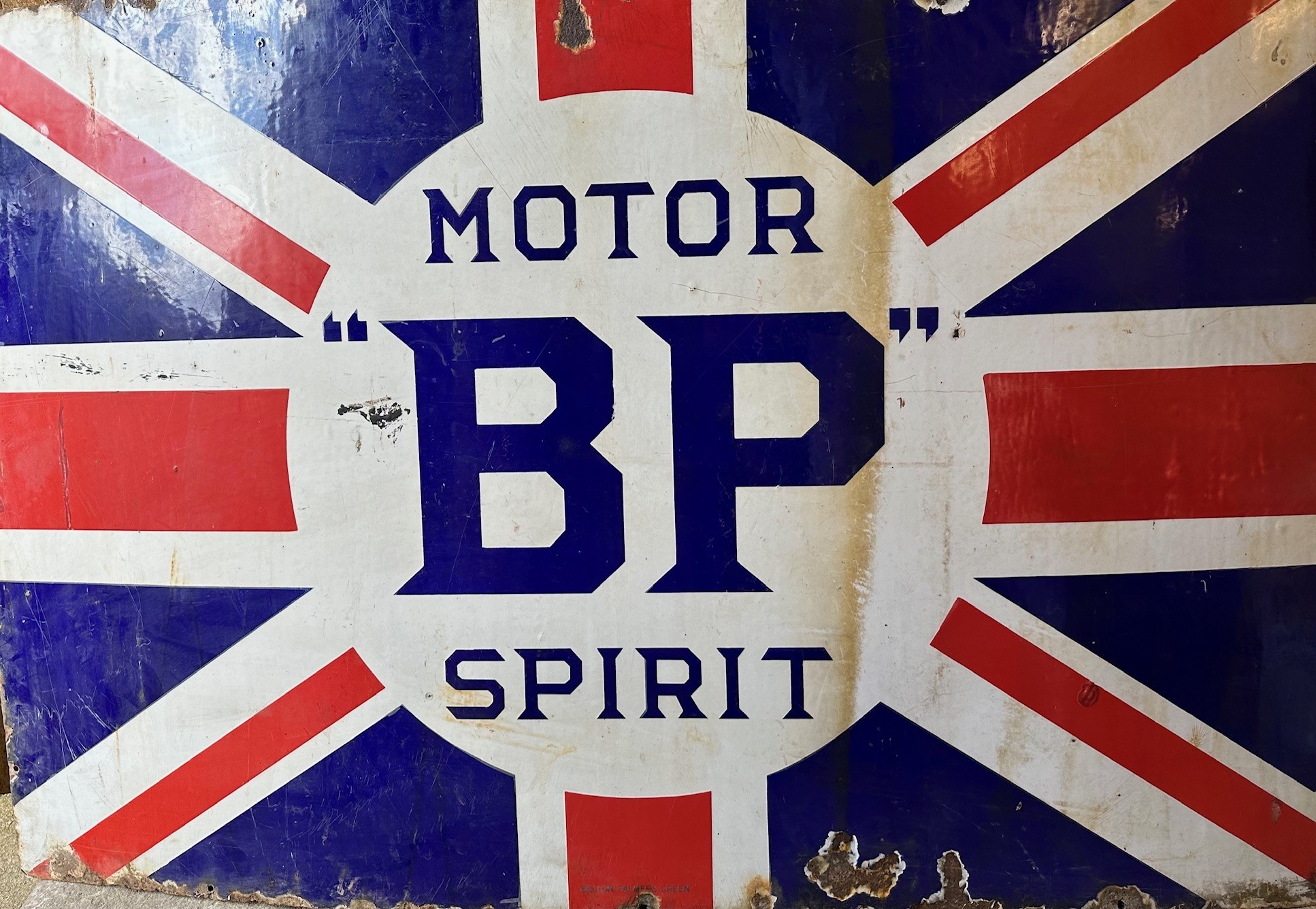 An enamel sign, BP Motor Spirit, on a Union Flag background, Bruton Palmers Green, 92 x 137 cm