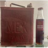 A bottle of Shell X100 motor oil, level to neck, and a Mex Motor Spirit 2 gallon can (2)