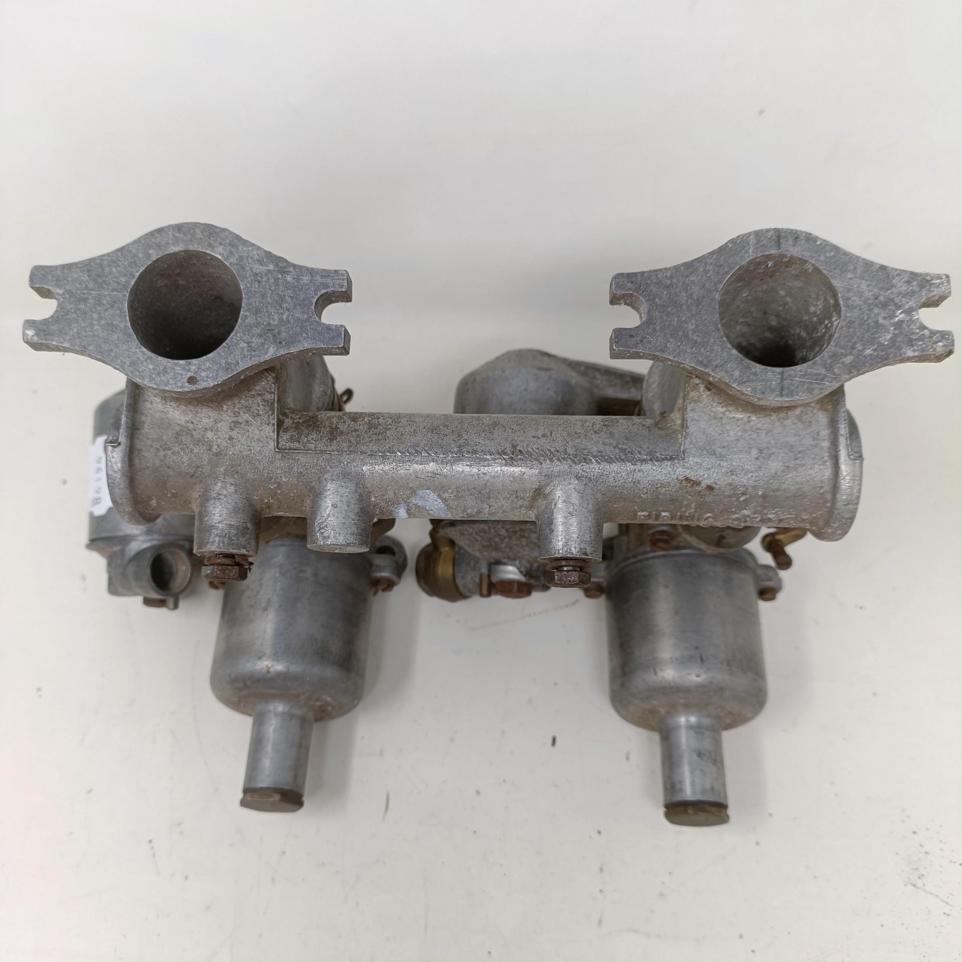 A pair of 1 1/4 inch SU carburettors, 6 inches between centres, on a manifold - Image 2 of 12