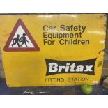 An enamel sign, Britax Fitting Station, Car Safety Equipment for Children, 56 x 76 cm A little