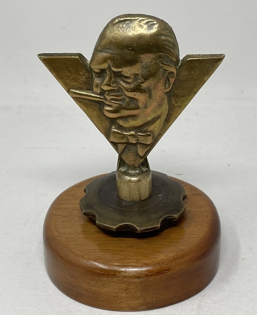 A Winston Churchill ‘V for Victory’ car mascot , rare version in bronze, 1940s differing from the