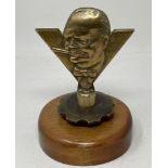 A Winston Churchill ‘V for Victory’ car mascot , rare version in bronze, 1940s differing from the