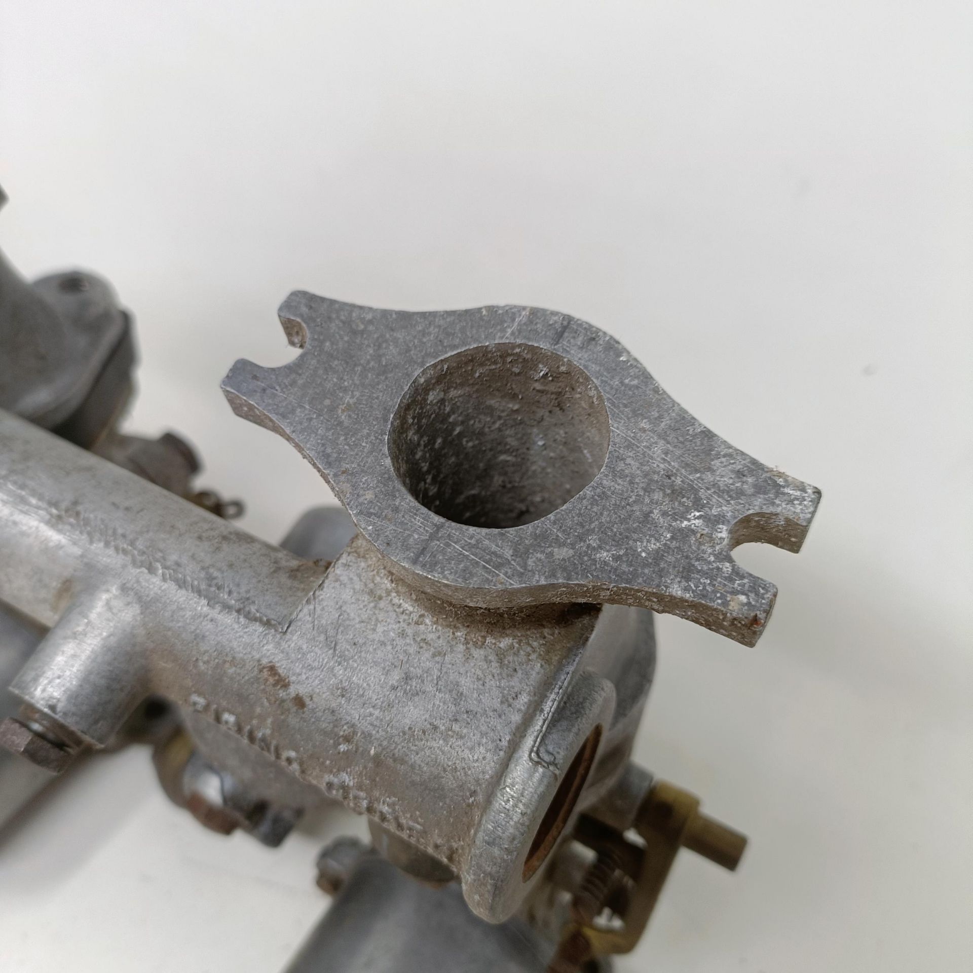 A pair of 1 1/4 inch SU carburettors, 6 inches between centres, on a manifold - Image 12 of 12