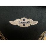 A Morgan Motor Company green motoring blanket