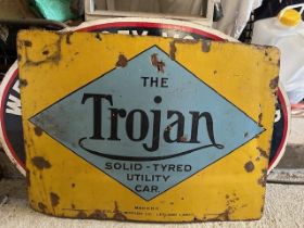 An enamel sign, The Trojan Solid-Tyred Utility Car, 55 x 75 cm A hole above The and with general