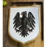 A bronze and painted Barclays Bank eagle sign, on a bracket, 48 cm wide (overall)