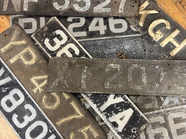 A group of 23 pre-war alloy registration number plates