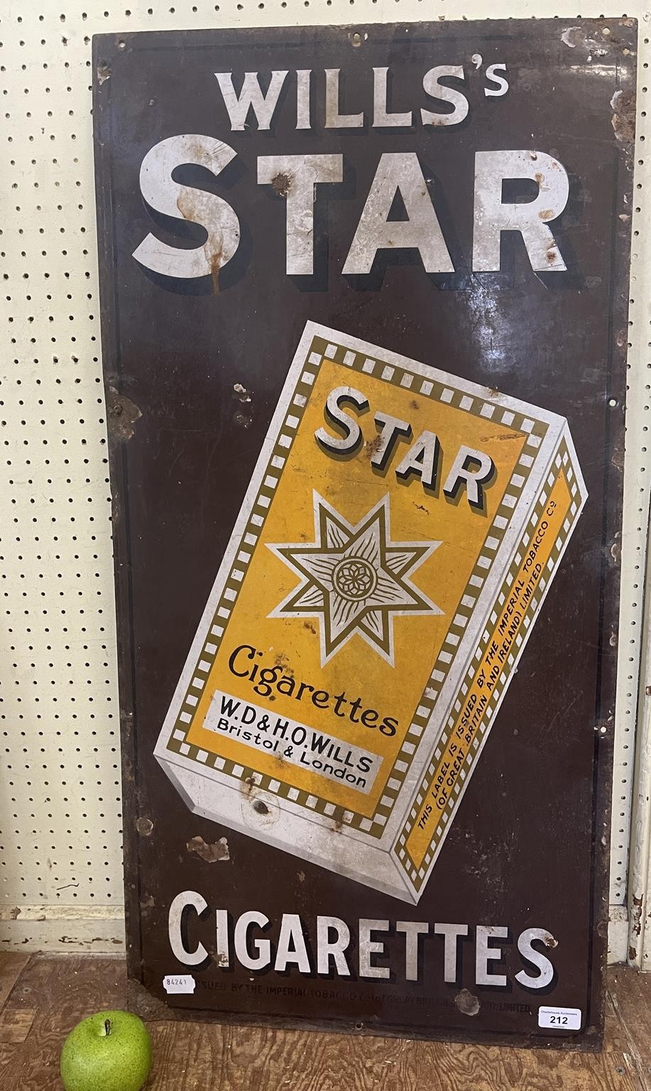 An enamel sign, Wills's Star Cigarettes, 90.5 x 46 cm some loss, garage stored, dirty